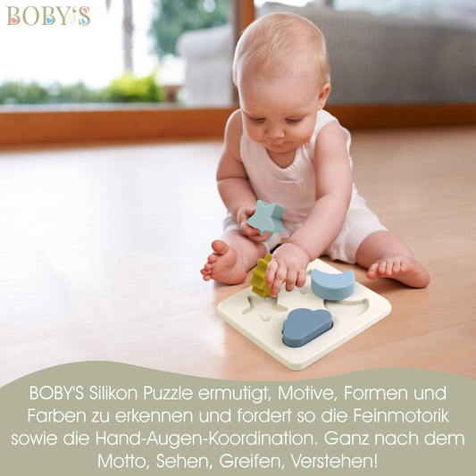 Steckpuzzle aus BPA-freiem Silikon mit Stern-, Sonnen-, Mond- und Wolkenformen für Babys zur Förderung der Motorik.